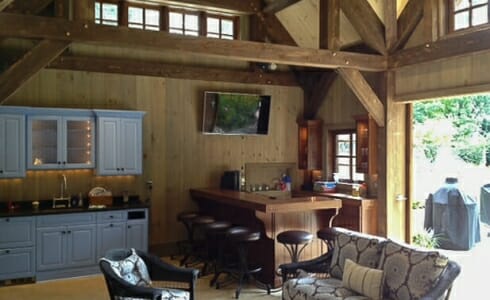 Garden Cottage Pool house in New Jersey with dark stained timber beams