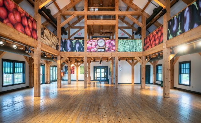 Brigham Hill Barn Interior with Rough Sawn Timber Trusses from Hemlock and White Pine