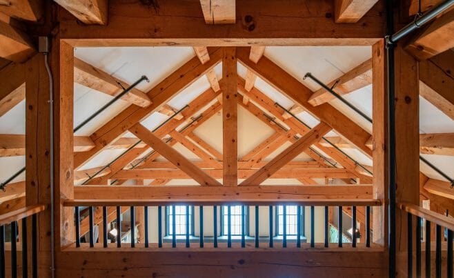Brigham Hill Barn Interior with Rough Sawn Timber Trusses from Hemlock and White Pine