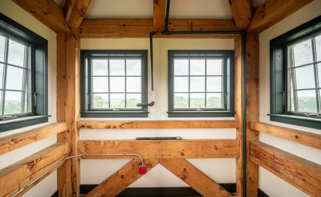 Brigham Hill Barn Interior with Rough Sawn Timber Trusses from Hemlock and White Pine