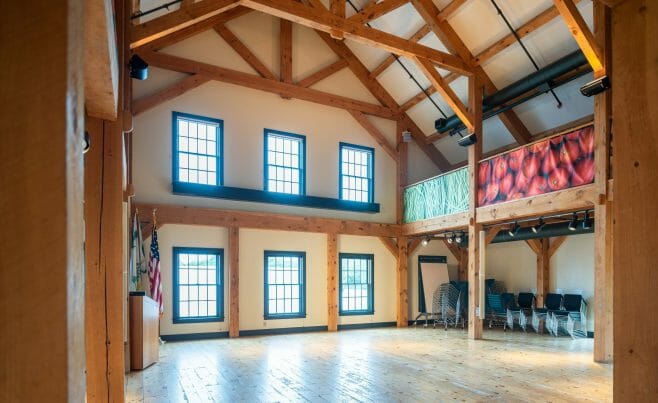 Brigham Hill Barn Interior with Rough Sawn Timber Trusses from Hemlock and White Pine