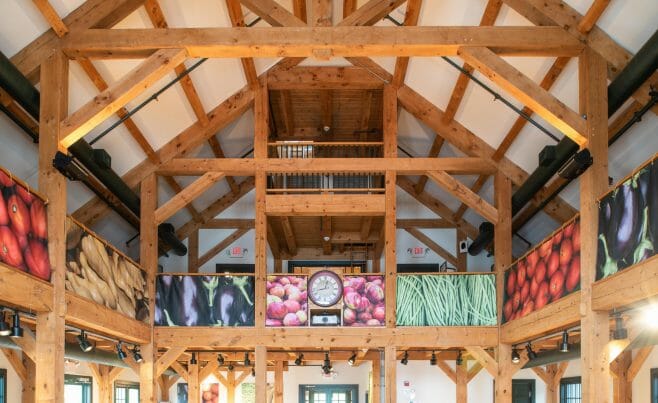 Brigham Hill Barn Interior with Rough Sawn Timber Trusses from Hemlock and White Pine