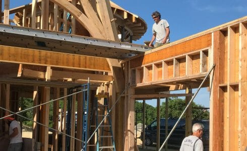 The reclaimed oak hammer beam trusses at the Seven Gates Residence in Martha's Vineyard