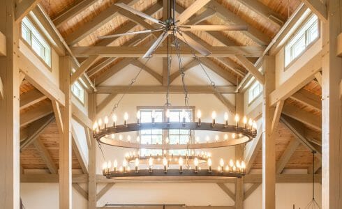 Interior of the Briar Barn Inn in Rowley, MA. The Monitor style barn features rough sawn Hemlock posts, beams, and trusses.