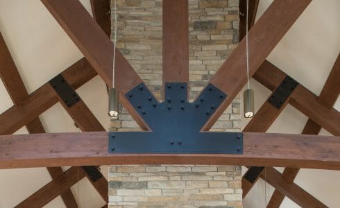 Interior of the Adirondack Welcome Center in Queensbury, NY featuring Douglas fir Glulam Heavy Timber Trusses with steel plates.