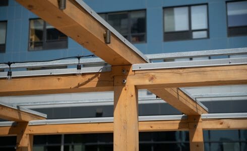 The Hamilton Pergola in Philadelphia, PA features a White Oak Pergola with Aluminum capping.