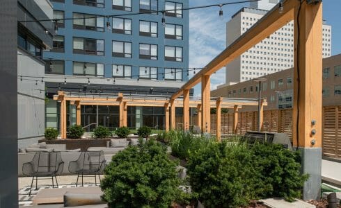 The Hamilton Pergola in Philadelphia, PA features a White Oak Pergola with Aluminum capping.