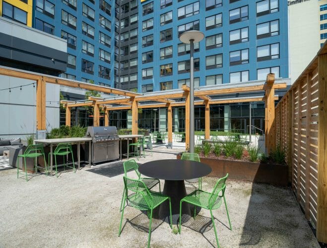 The Hamilton Pergola in Philadelphia, PA features a White Oak Pergola with Aluminum capping.