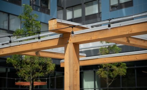 The Hamilton Pergola in Philadelphia, PA features a White Oak Pergola with Aluminum capping.