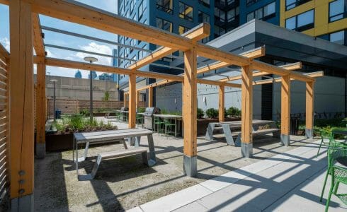 The Hamilton Pergola in Philadelphia, PA features a White Oak Pergola with Aluminum capping.