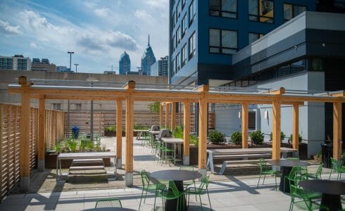 The Hamilton Pergola in Philadelphia, PA features a White Oak Pergola with Aluminum capping.