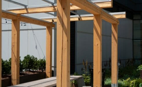 The Hamilton Pergola in Philadelphia, PA features a White Oak Pergola with Aluminum capping.