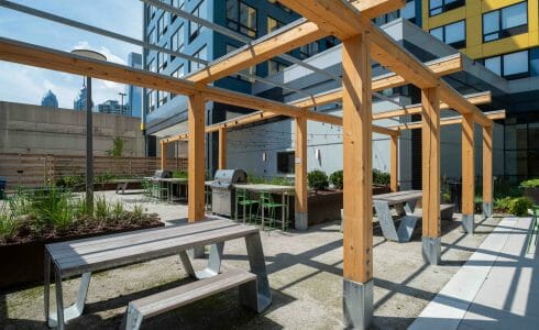 The Hamilton Pergola in Philadelphia, PA features a White Oak Pergola with Aluminum capping.