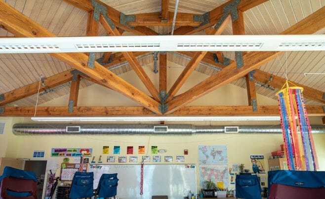 A classroom in the Centennial Senior Center that features Timber Trusses with steel plates