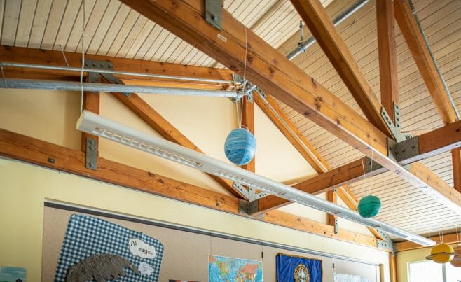 A classroom in the Centennial Senior Center that features Timber Trusses with steel plates