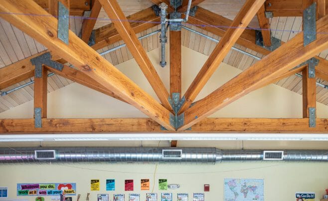 A classroom in the Centennial Senior Center that features Timber Trusses with steel plates