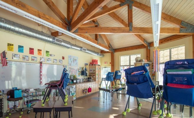 A classroom in the Centennial Senior Center that features Timber Trusses with steel plates