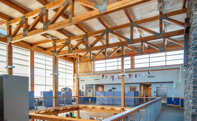 The Concord Christian Academy (previously the Centennial Senior Center) features cathedral ceilings and timber girder trusses.