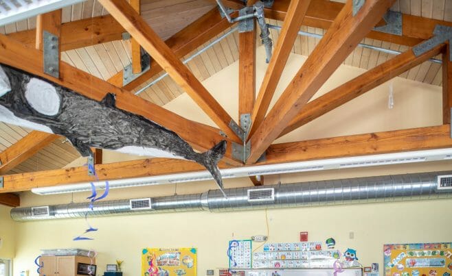 A classroom in the Centennial Senior Center that features Timber Trusses with steel plates