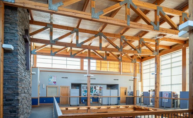 The Concord Christian Academy (previously the Centennial Senior Center) features cathedral ceilings and timber girder trusses.