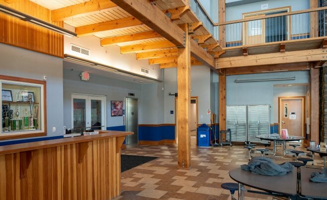 The Concord Christian Academy (previously the Centennial Senior Center) features cathedral ceilings and timber girder trusses.