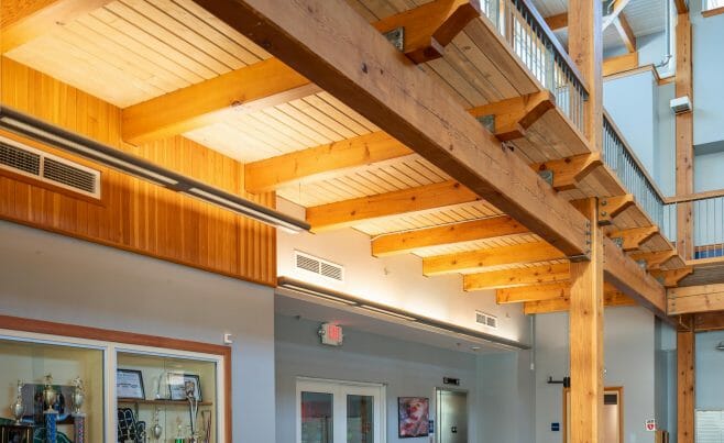 The Concord Christian Academy (previously the Centennial Senior Center) features cathedral ceilings and timber girder trusses.