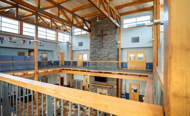 The Concord Christian Academy (previously the Centennial Senior Center) features cathedral ceilings and timber girder trusses.