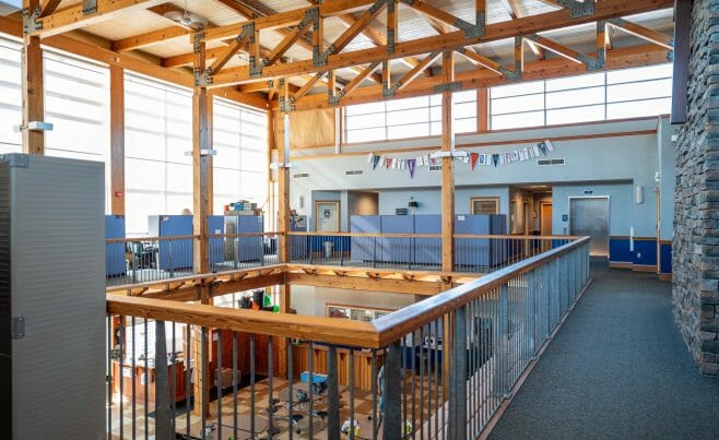 The Concord Christian Academy (previously the Centennial Senior Center) features cathedral ceilings and timber girder trusses.