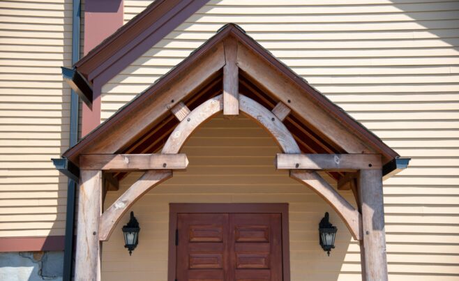 The completed interior of St. Michael's Church with arched trusses and steel tie rods