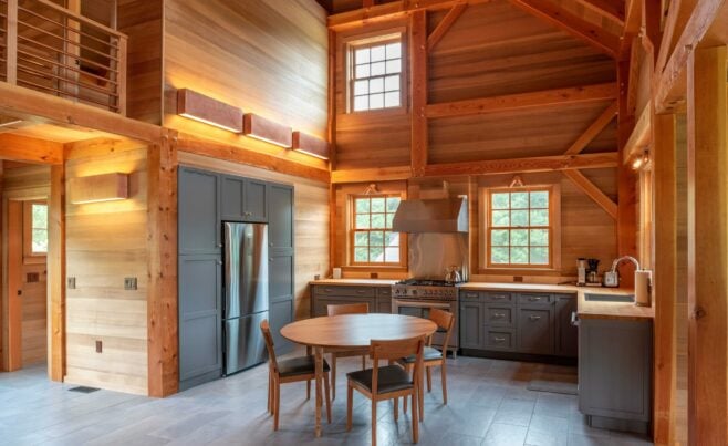 Interior of the Guest House on Martha's Vineyard Beach House that features Timber Posts and Beams, and Cedar cladding