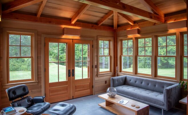 Interior of the Guest House on Martha's Vineyard Beach House that features Timber Posts and Beams, and Cedar cladding