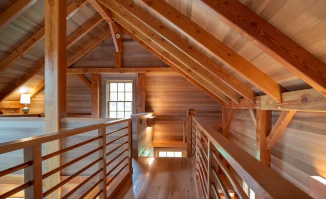 Interior of the Guest House on Martha's Vineyard Beach House that features Timber Posts and Beams, and Cedar cladding