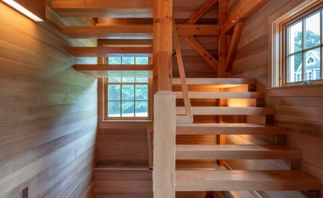 Interior of the Guest House on Martha's Vineyard Beach House that features Timber Posts and Beams, and Cedar cladding