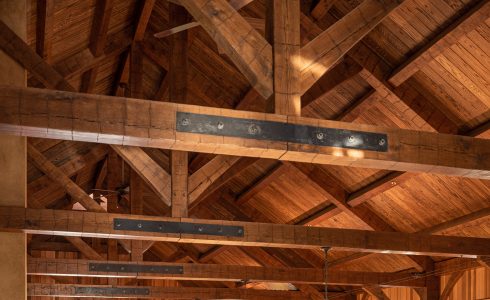 Steel Gusset Plate on a King Post Truss. Oak Hand Hewn Barn