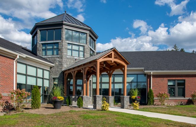 Perkins school entry with timber truss system